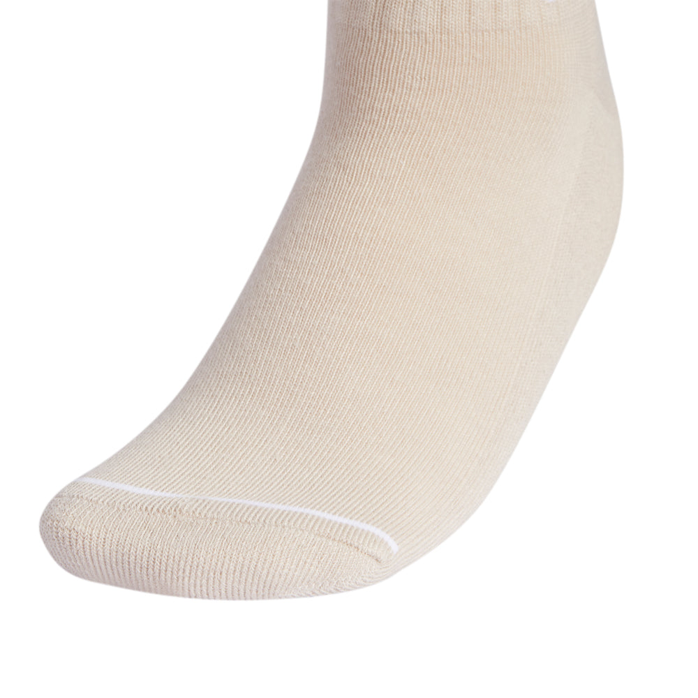 Close-up of womens sports socks highlighting the breathable fabric and cushioned sole for comfort during workouts.
