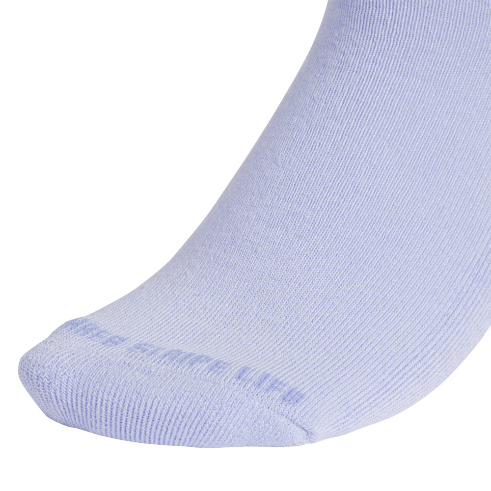 Model wearing Ultimate Comfort Womens High Quarter Cushioned Sports Socks during a run, highlighting the fit and functionality.