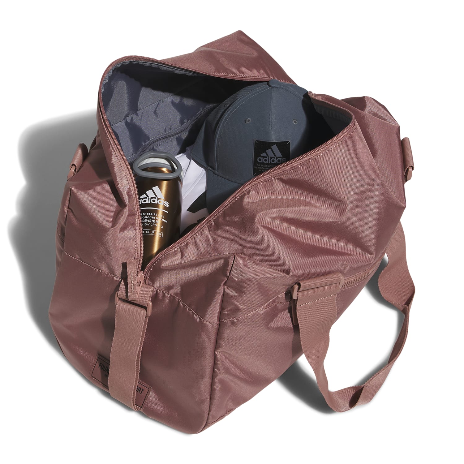 TravelPro Lounge Duffel hanging on a hook, demonstrating its durability and versatility