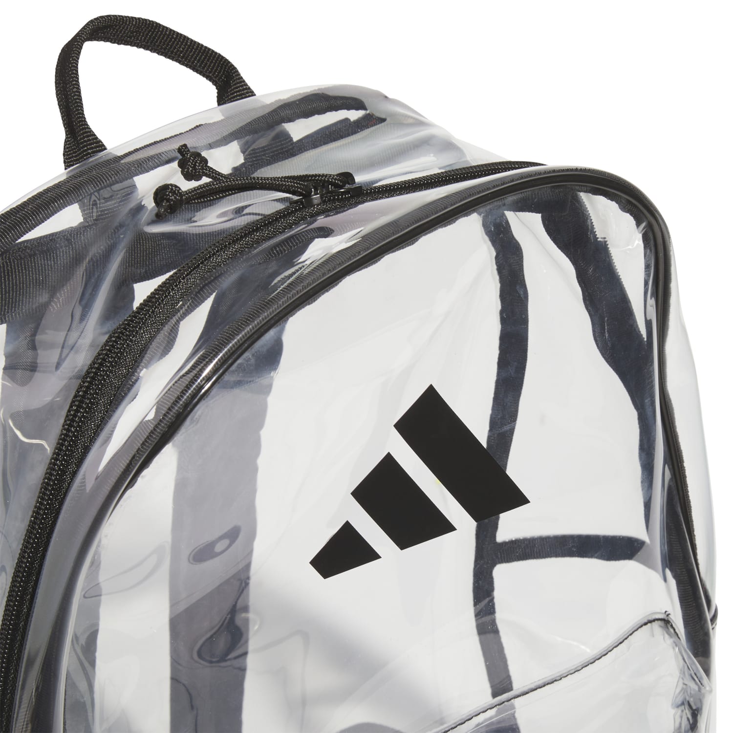 Side profile of hiker carrying the lightweight travel backpack on mountain trail