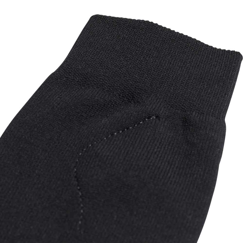 Front view of kids soccer sock guards showcasing removable shield feature.