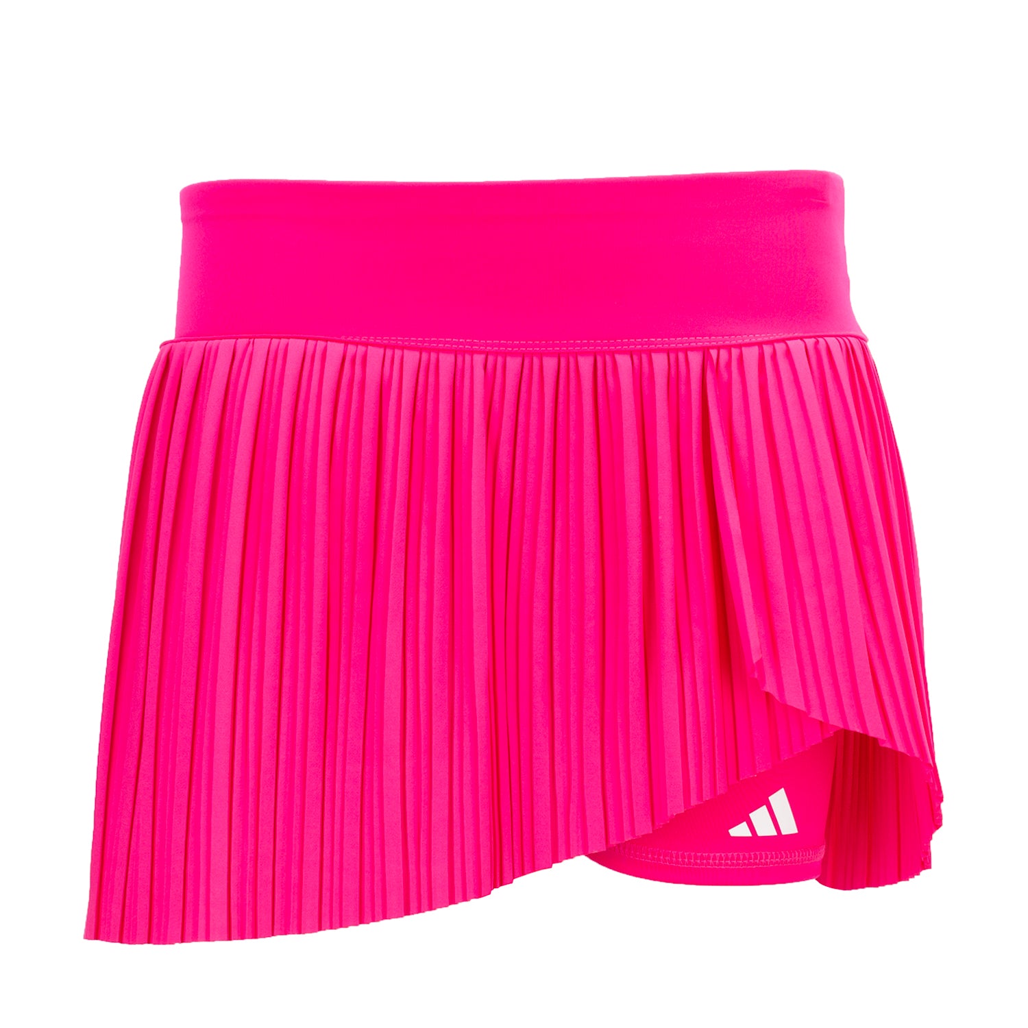 Youth pleated skort shown in action at a tennis match, highlighting the built-in shorts.