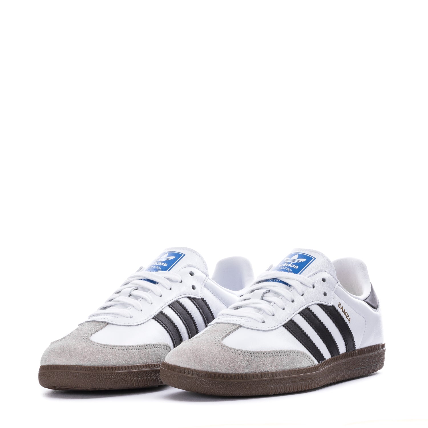 Fashionable streetwear look featuring Samba OG mens shoes in urban environment