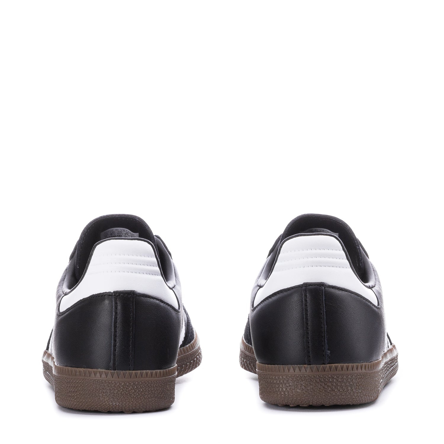 Close-up of the Adidas Samba OG mens shoes laces and tongue, showcasing the bold stitching.