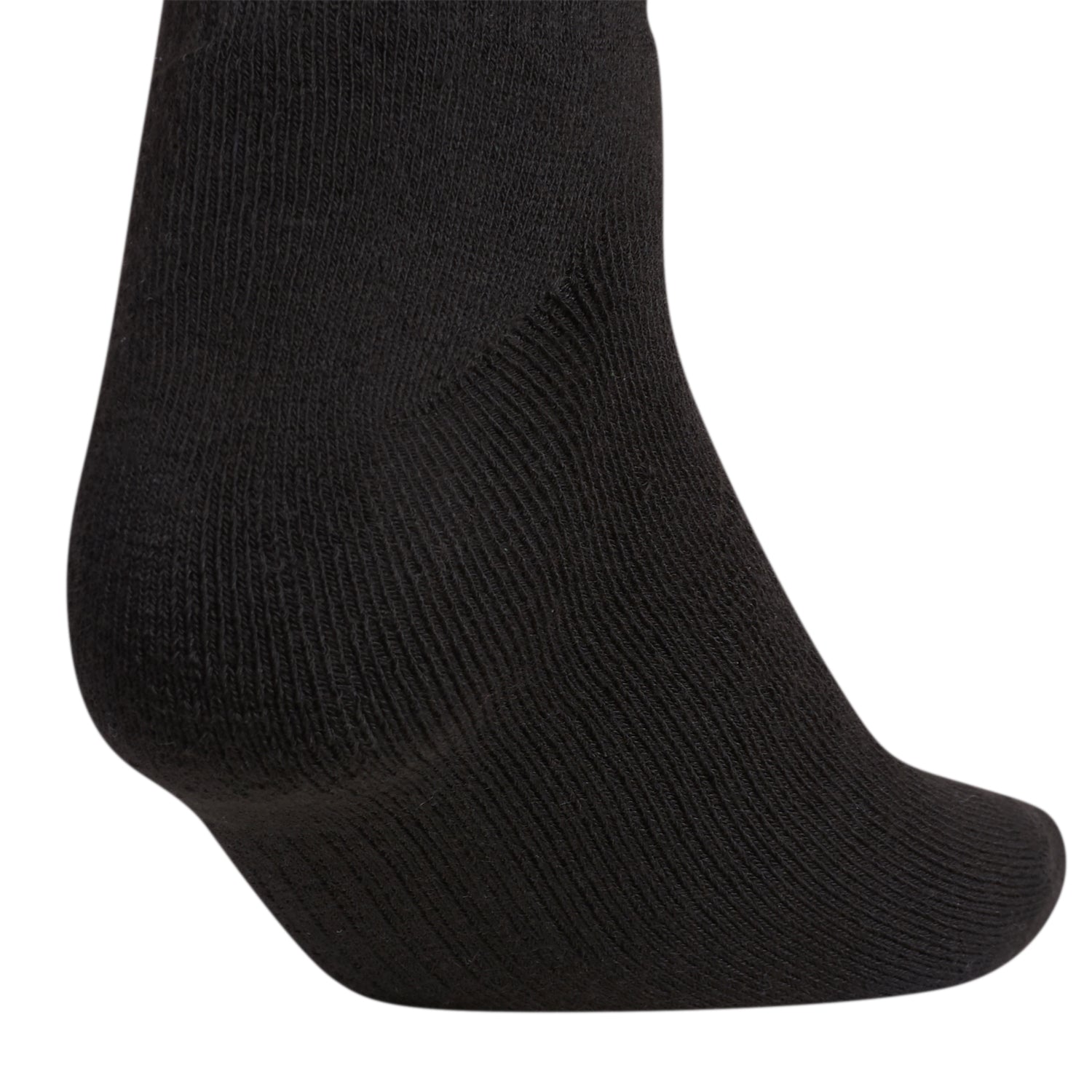 Lifestyle shot showing large crew socks for men and women worn with sneakers