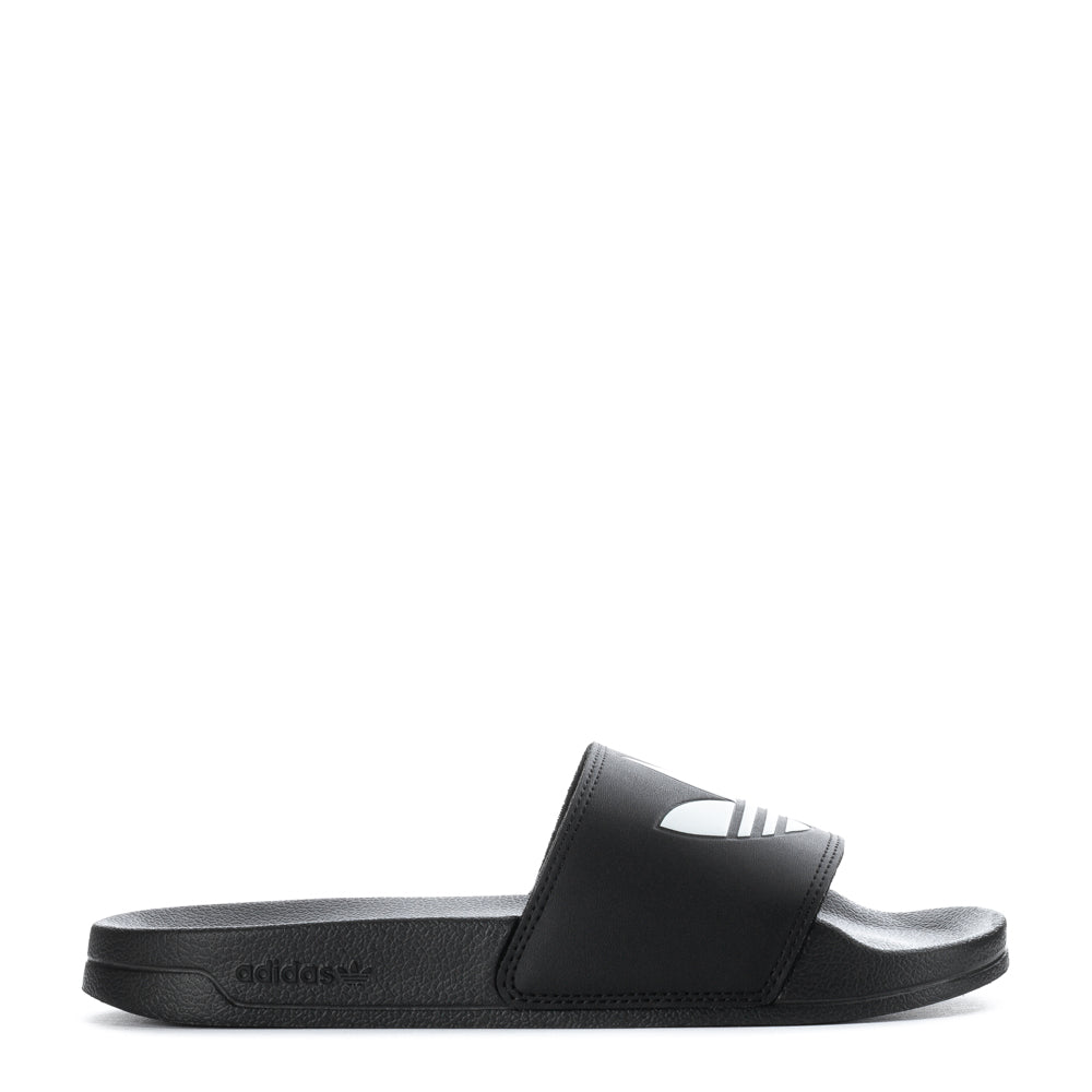 Close-up of adidas Adilette Lite men's slides showing the cushioned footbed and synthetic strap