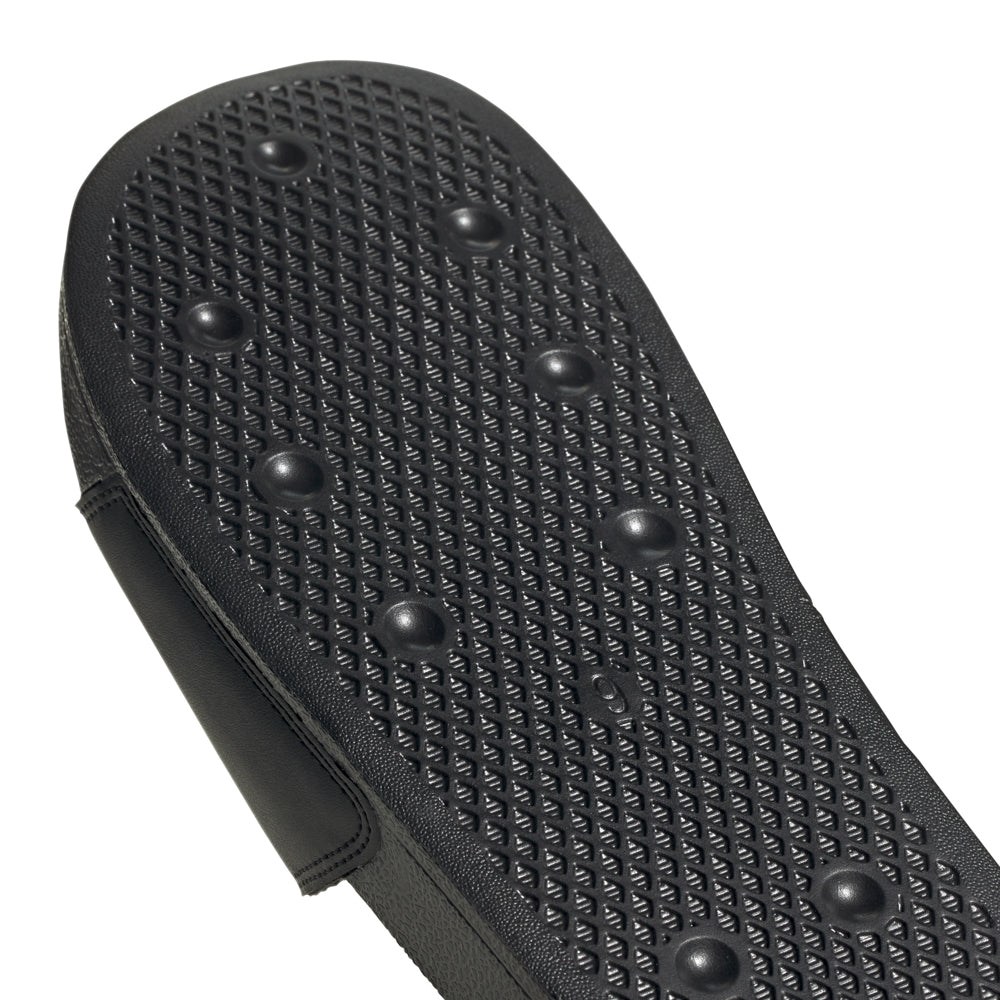 Side view of lightweight adidas slides ideal for summer casual wear
