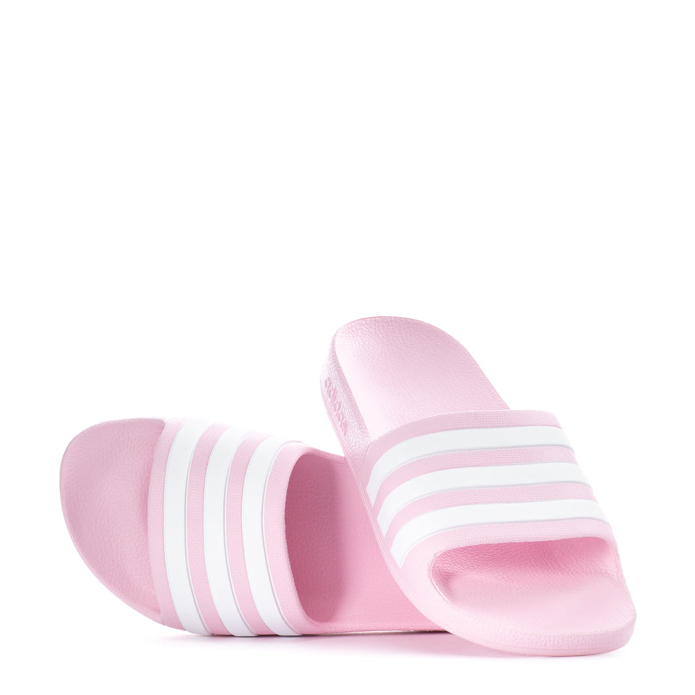Side view of lightweight adidas kids slides with molded EVA upper