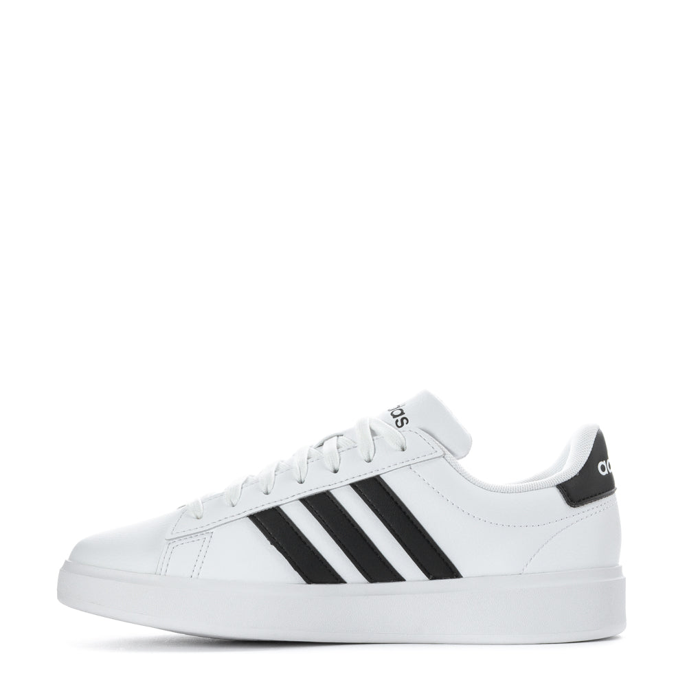 Top-down view of Adidas Grand Court sneakers, highlighting the lace closure and synthetic leather upper.