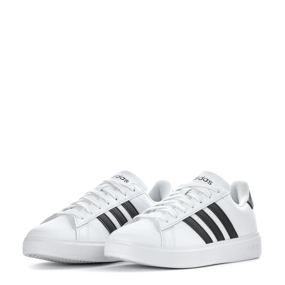 Adidas Grand Court womens sneakers worn during a casual outing, demonstrating their versatility and comfort.