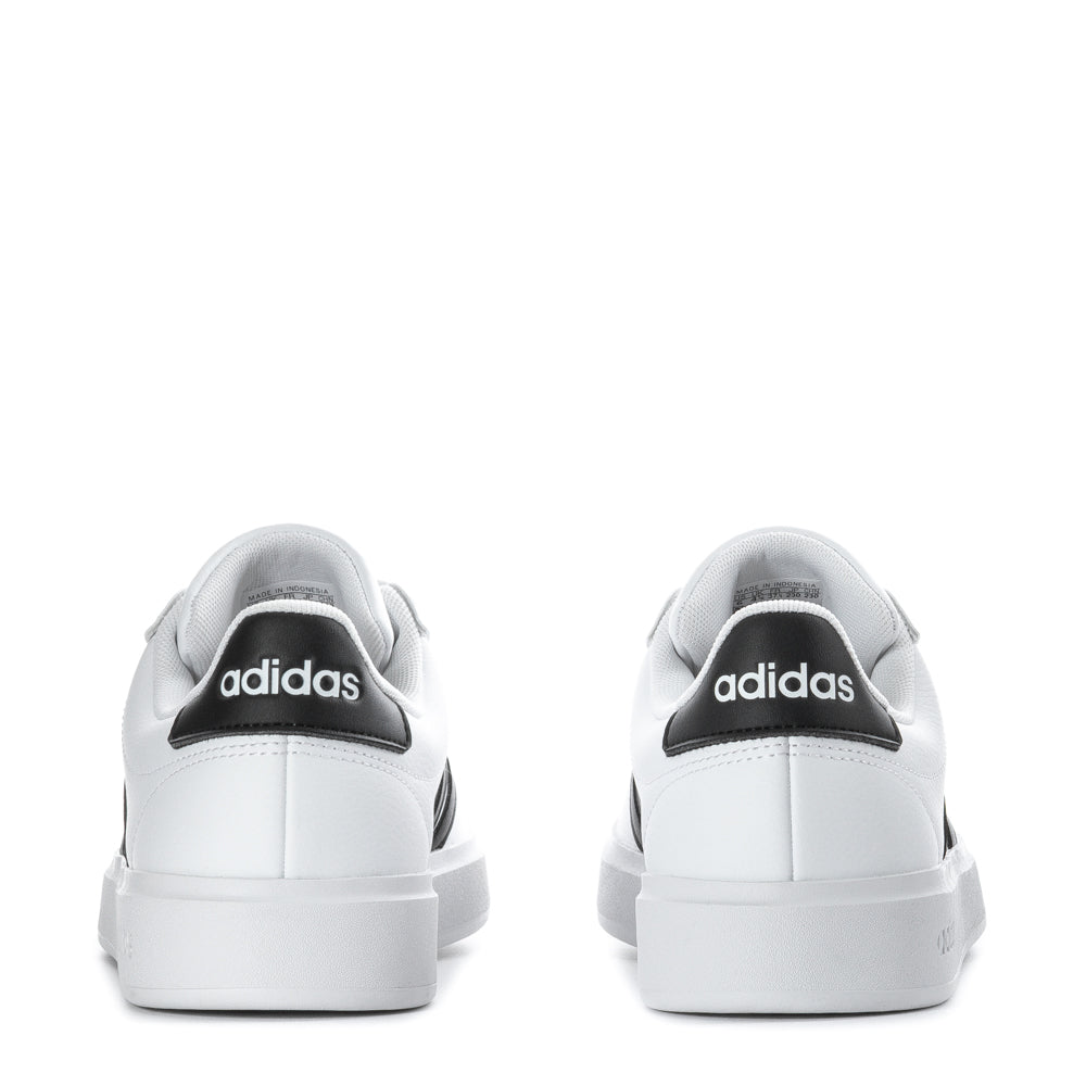 Top-down view of Adidas Grand Court sneakers, highlighting the lace closure and synthetic leather upper.