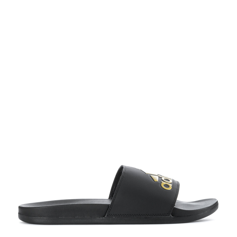 Close-up of men's adidas slides showing the synthetic upper and contoured footbed