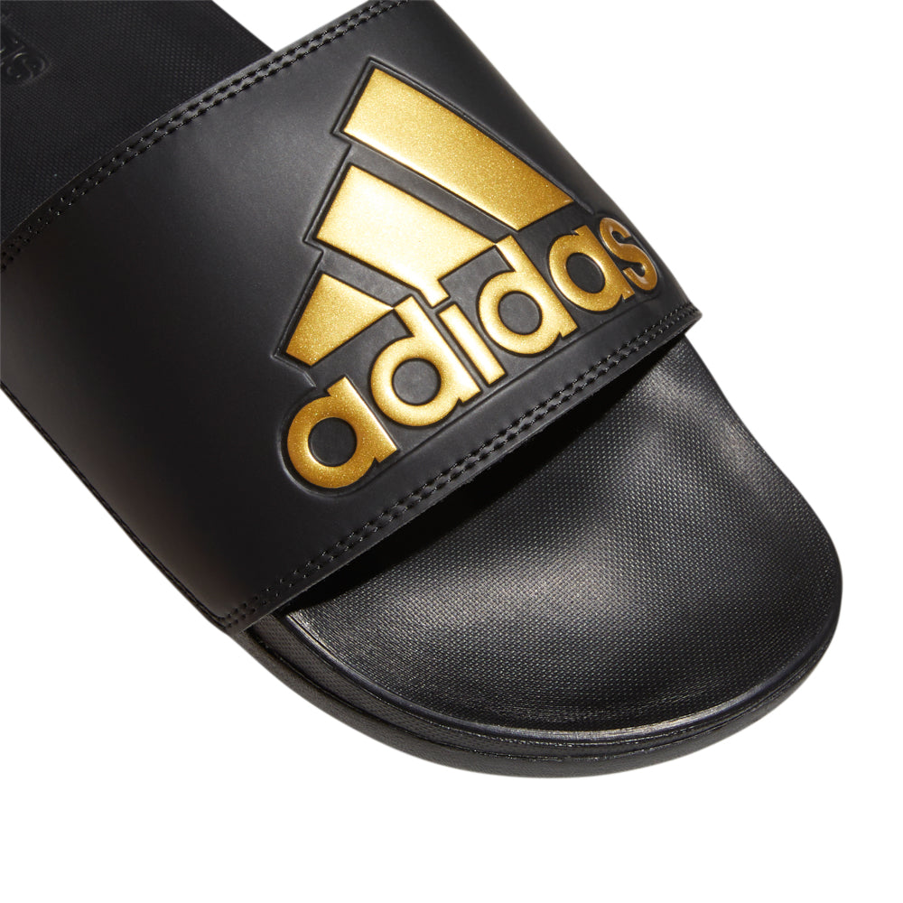 Side view of adidas slides with injected EVA outsole for durability