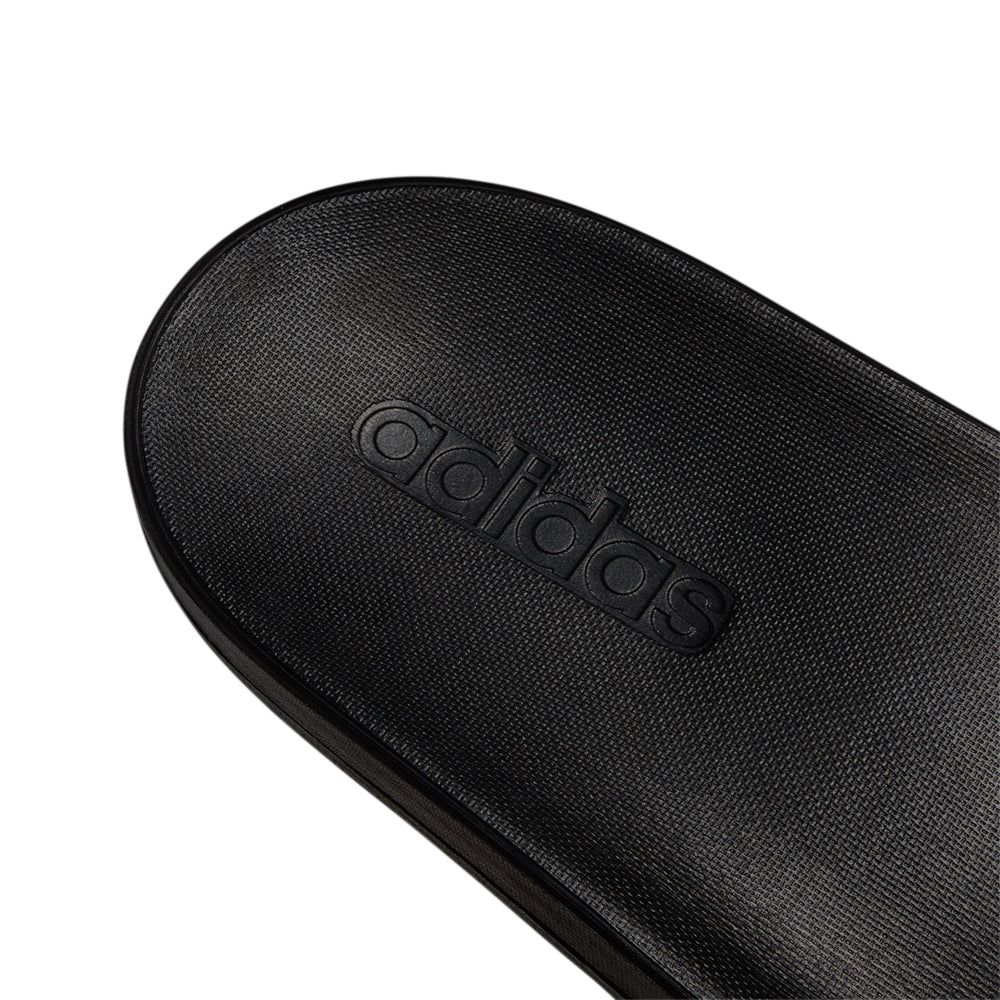 Close-up of mens adidas slides showing the synthetic upper and contoured footbed
