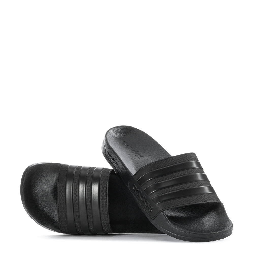 Person wearing comfortable mens pool slides after swimming