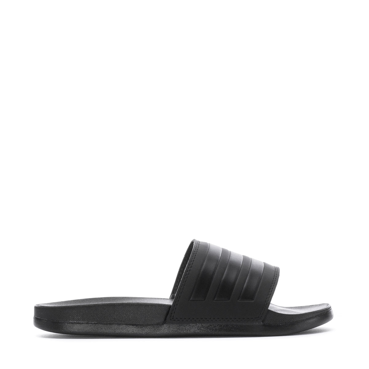 Close-up of adidas Adilette Comfort women's slides showing the contoured footbed and synthetic upper