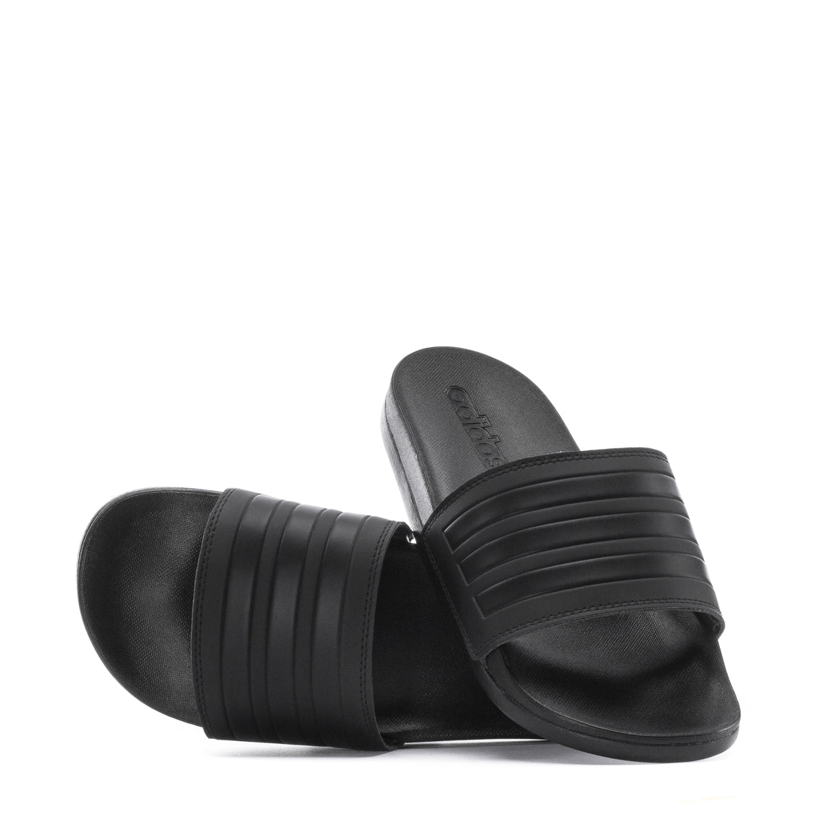 Product shot of adidas slides with injected EVA outsole and casual design