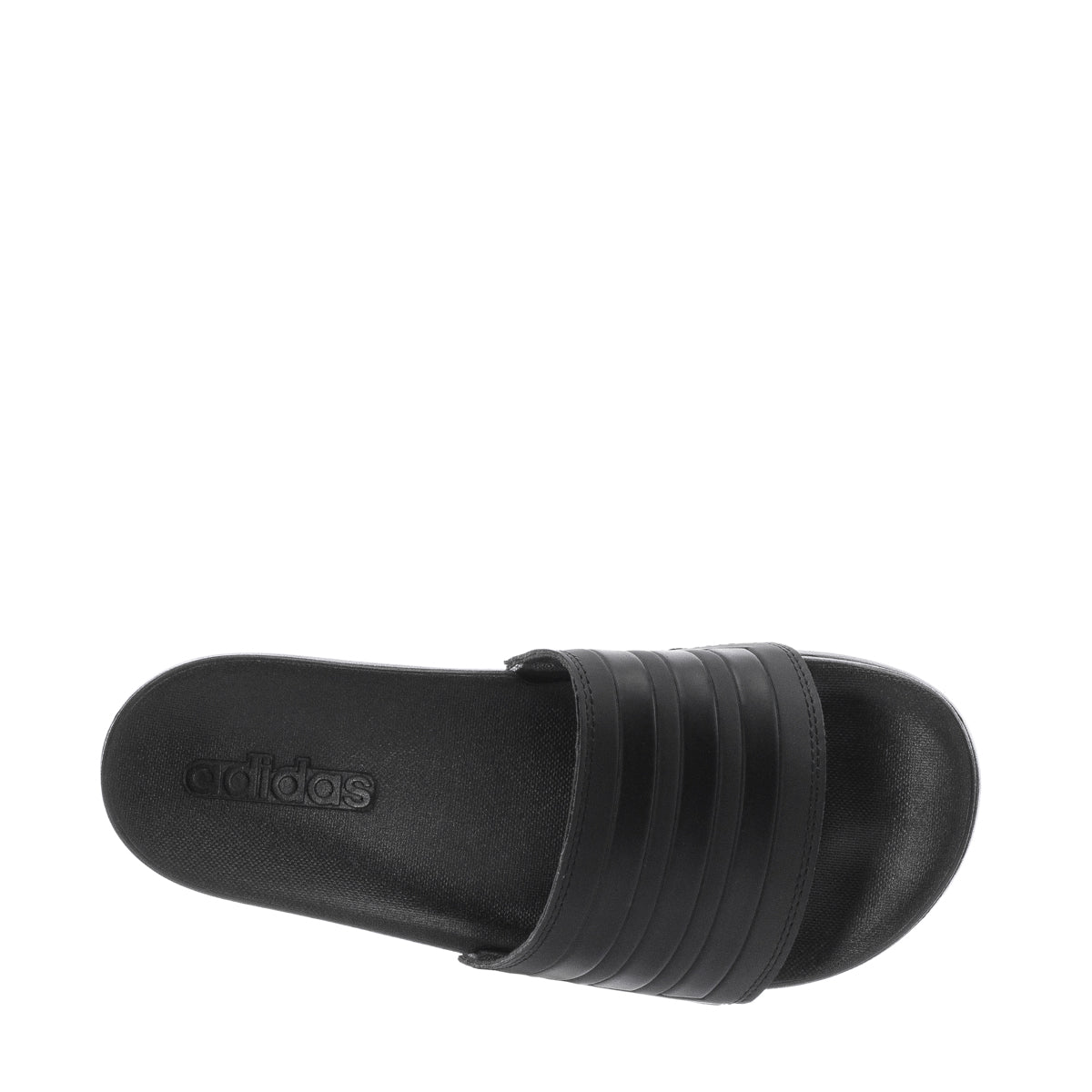 Close-up of adidas Adilette Comfort womens slides showing the contoured footbed and synthetic upper