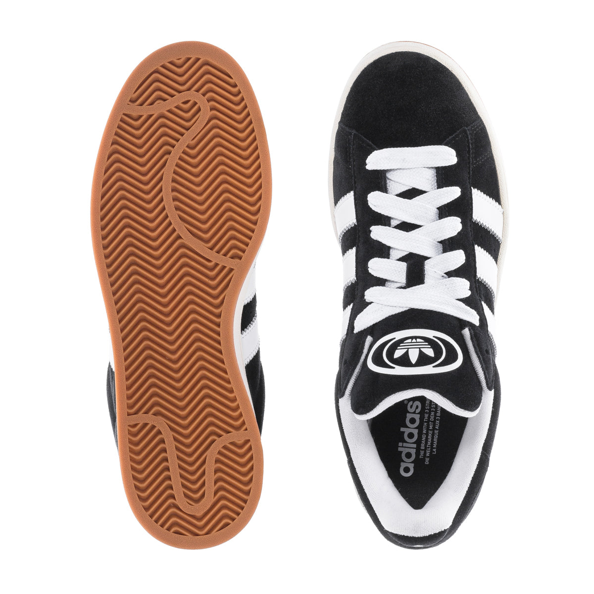 Top-down angle of adidas Campus 00s black leather casual sneakers on city sidewalk