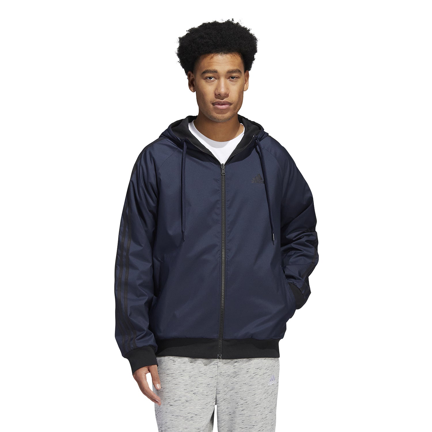 Close-up of adidas jacket with fitted collar and logo