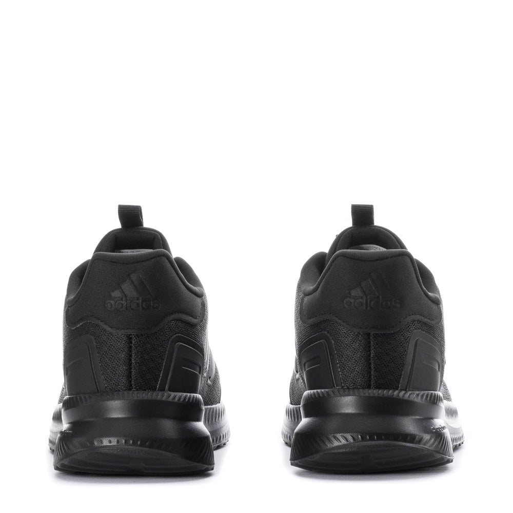 Close-up of breathable mesh upper of Adidas youth sneakers, perfect for outdoor play.