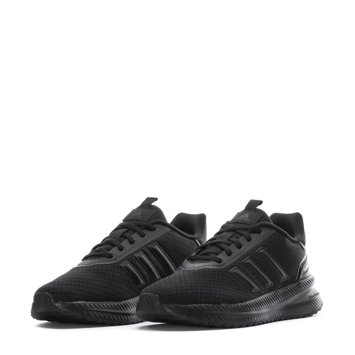 Adidas X_PLR Path black womens sneakers worn during an outdoor run, highlighting their versatility.