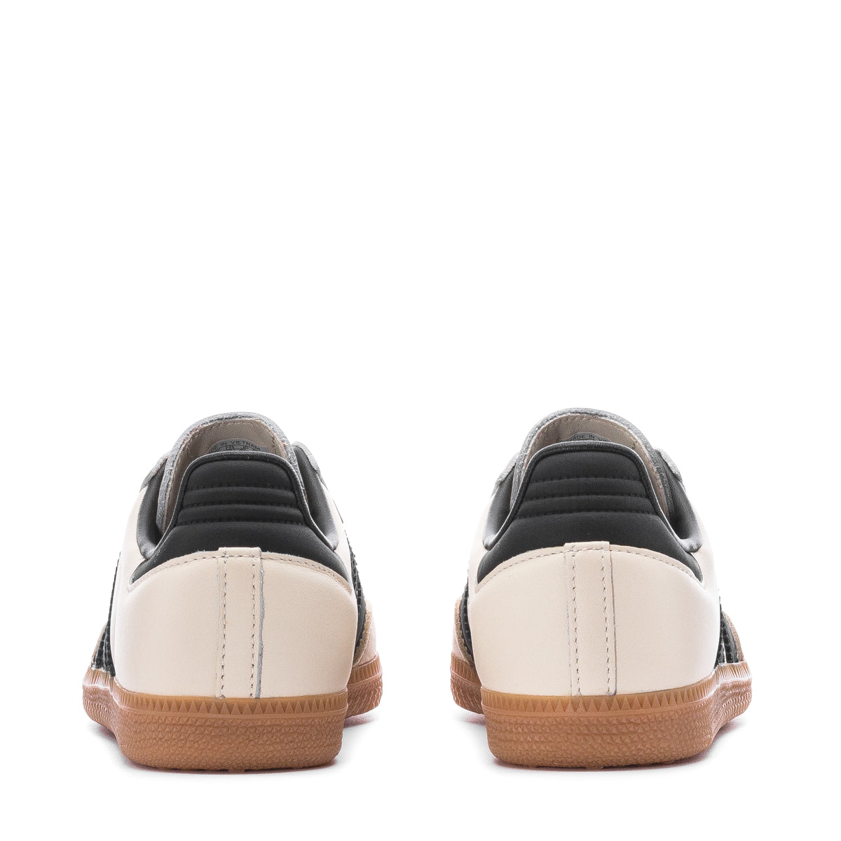 Side view of Adidas Samba OG Womens sneakers on a city street