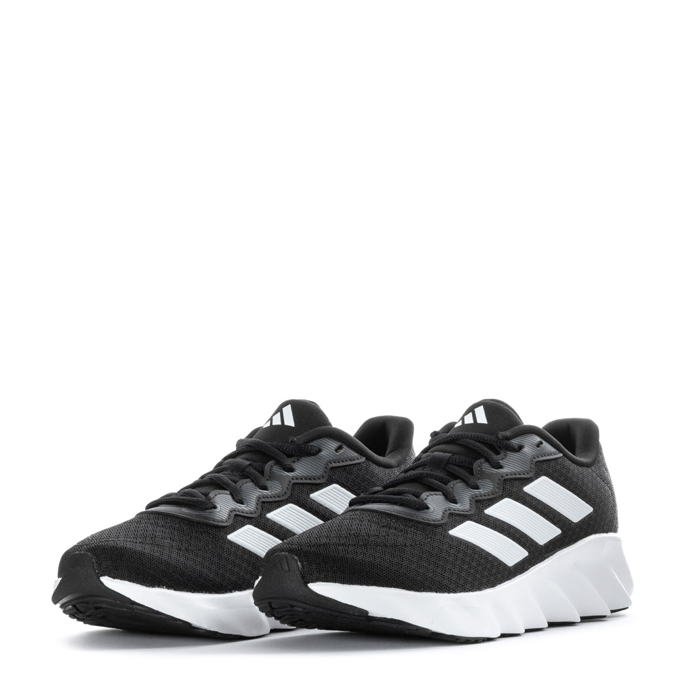 Adidas Switch Move Womens Running Shoes in action during a jogging session in the neighborhood.