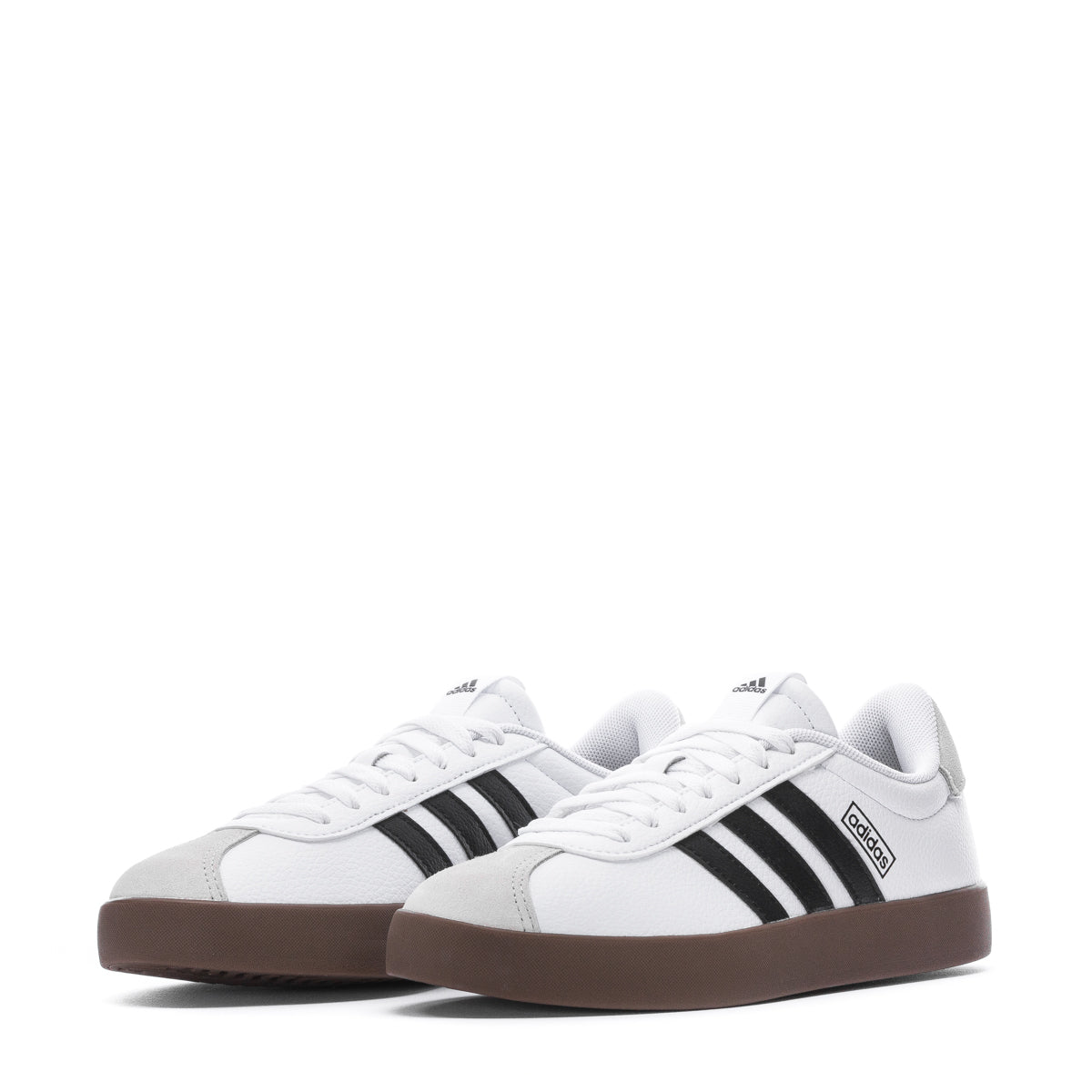 Women’s skate shoes styled with urban streetwear, photographed in motion