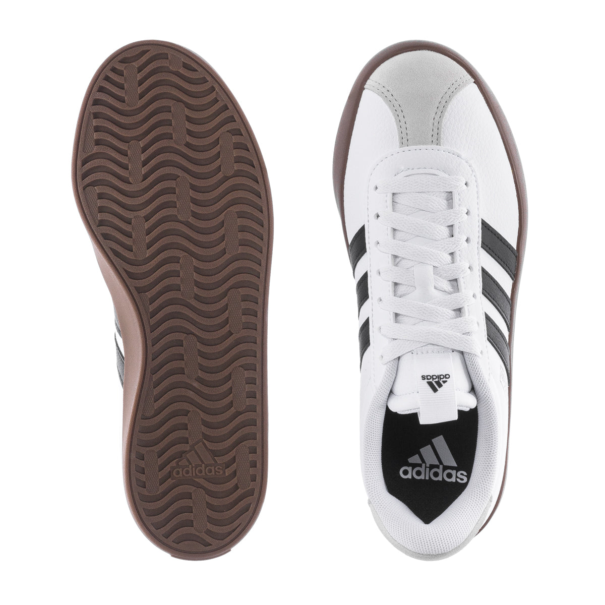 Side profile of adidas casual sneakers in neutral tones