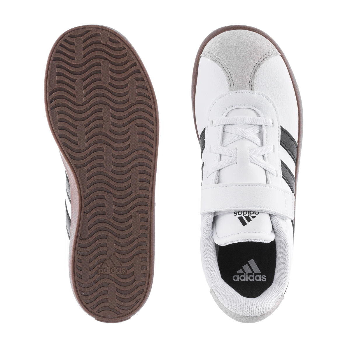 Close-up of adidas VL Court 3.0 kids sneakers showing suede upper and rubber sole