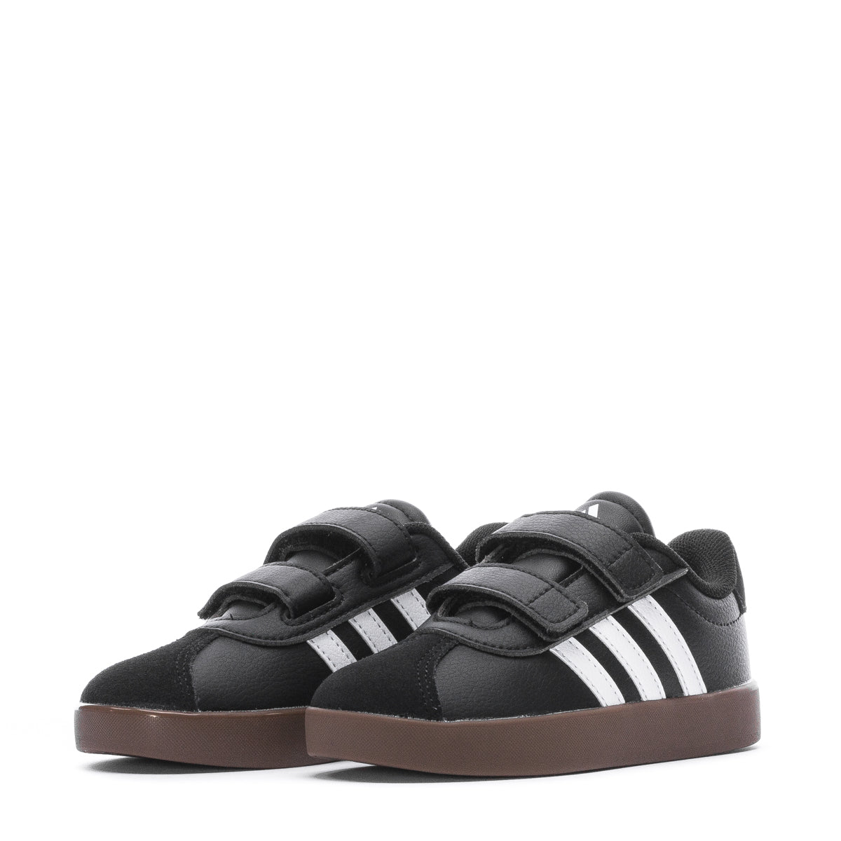 Active kids enjoying playtime in their Adidas Velcro toddler shoes