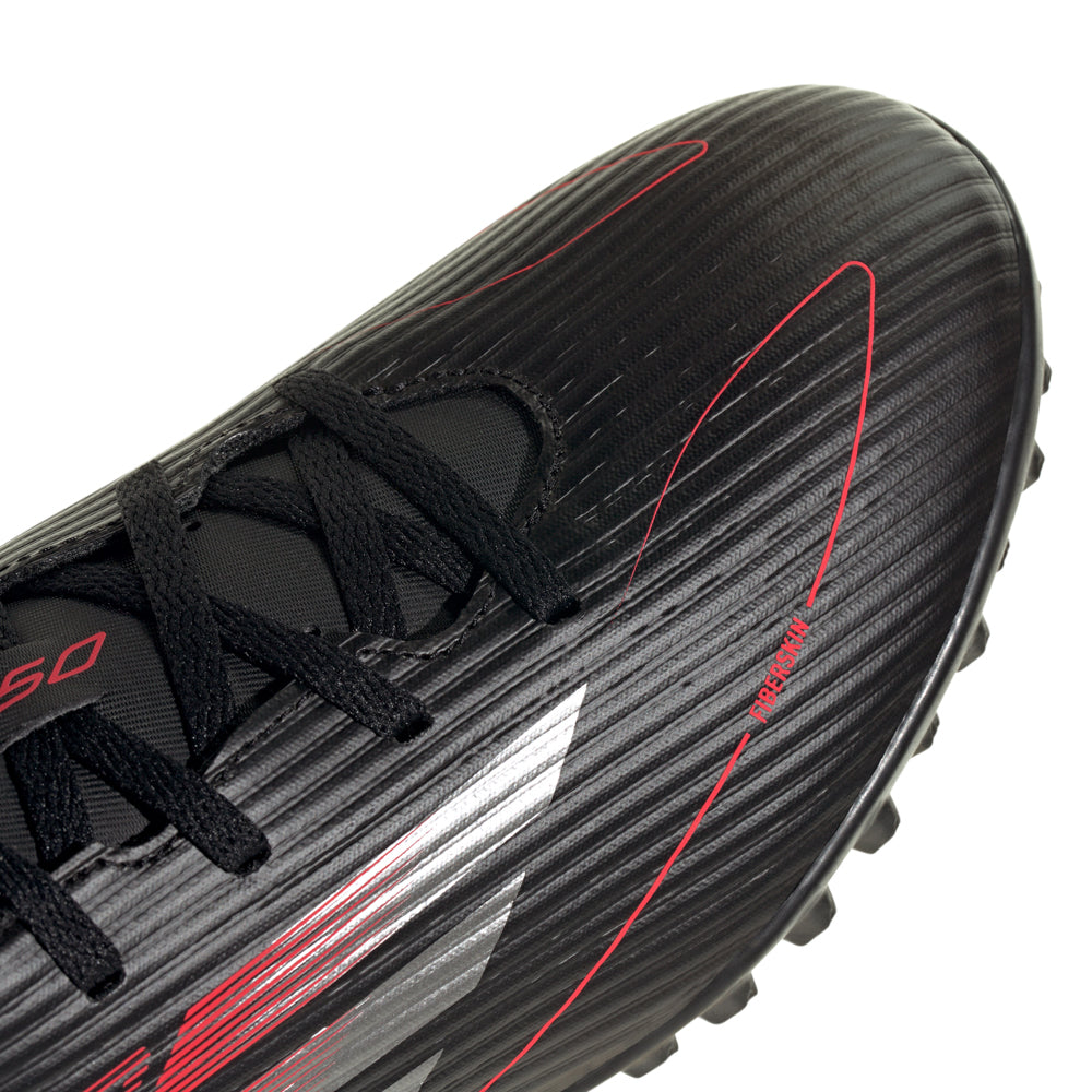 Top view of Adidas F50 Club TF shoes showing soft toe box and branding