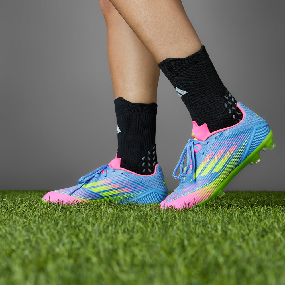 Side view of lightweight mens soccer shoes with Fiberskin upper for enhanced ball control