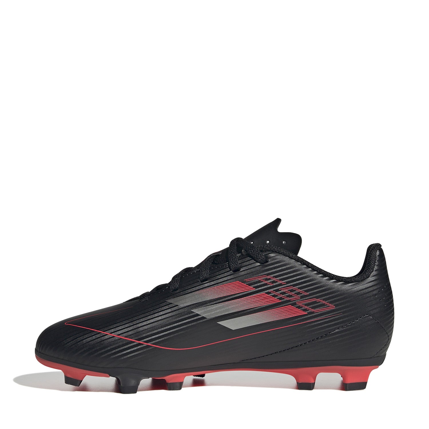 Close-up of the Adidas F50 cleats highlighting the traction studs, perfect for firm ground soccer play.