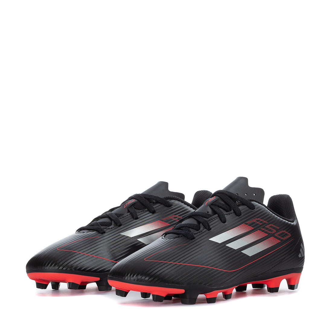 Side view of the slip-on Adidas F50 Club FG Youth Cleats, demonstrating ease of use for kids.