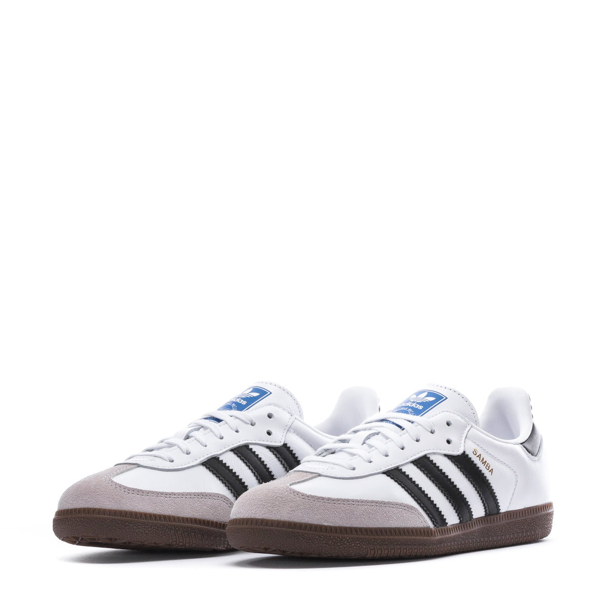 Side view of adidas Samba OG youth sneakers highlighting gum rubber sole