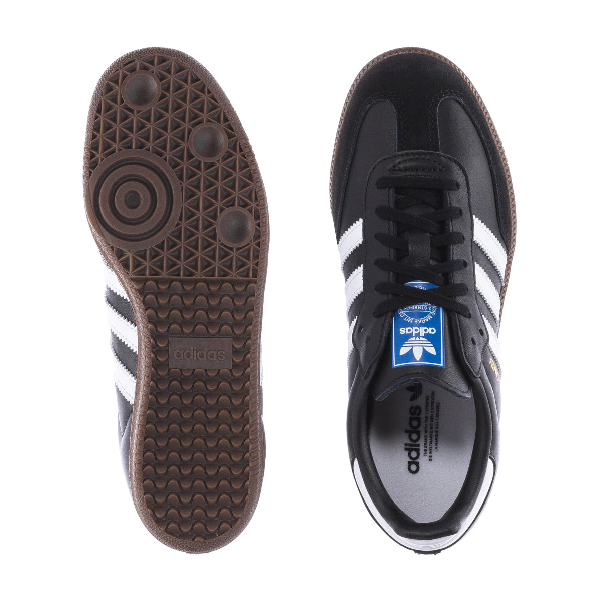 Top-down view of white Adidas Samba youth shoes showing leather upper and suede T-toe