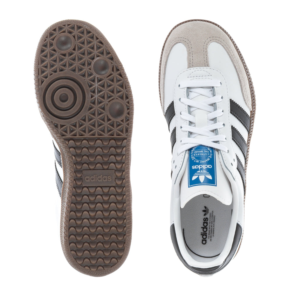 Side view of Samba OG kids sneakers highlighting stylish design and supportive sole