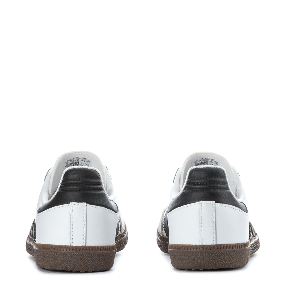 Children playing outdoors wearing Samba OG sneakers, showing comfort and durability