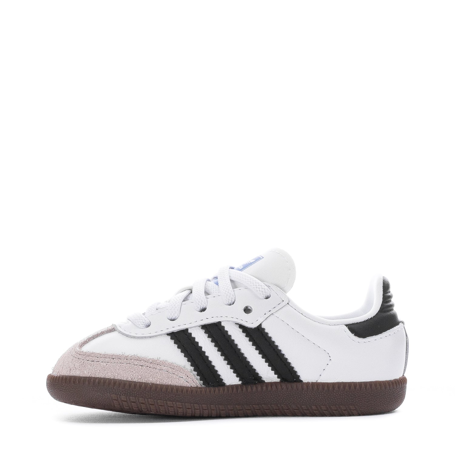 Toddler wearing Adidas Samba OG sneakers during outdoor play