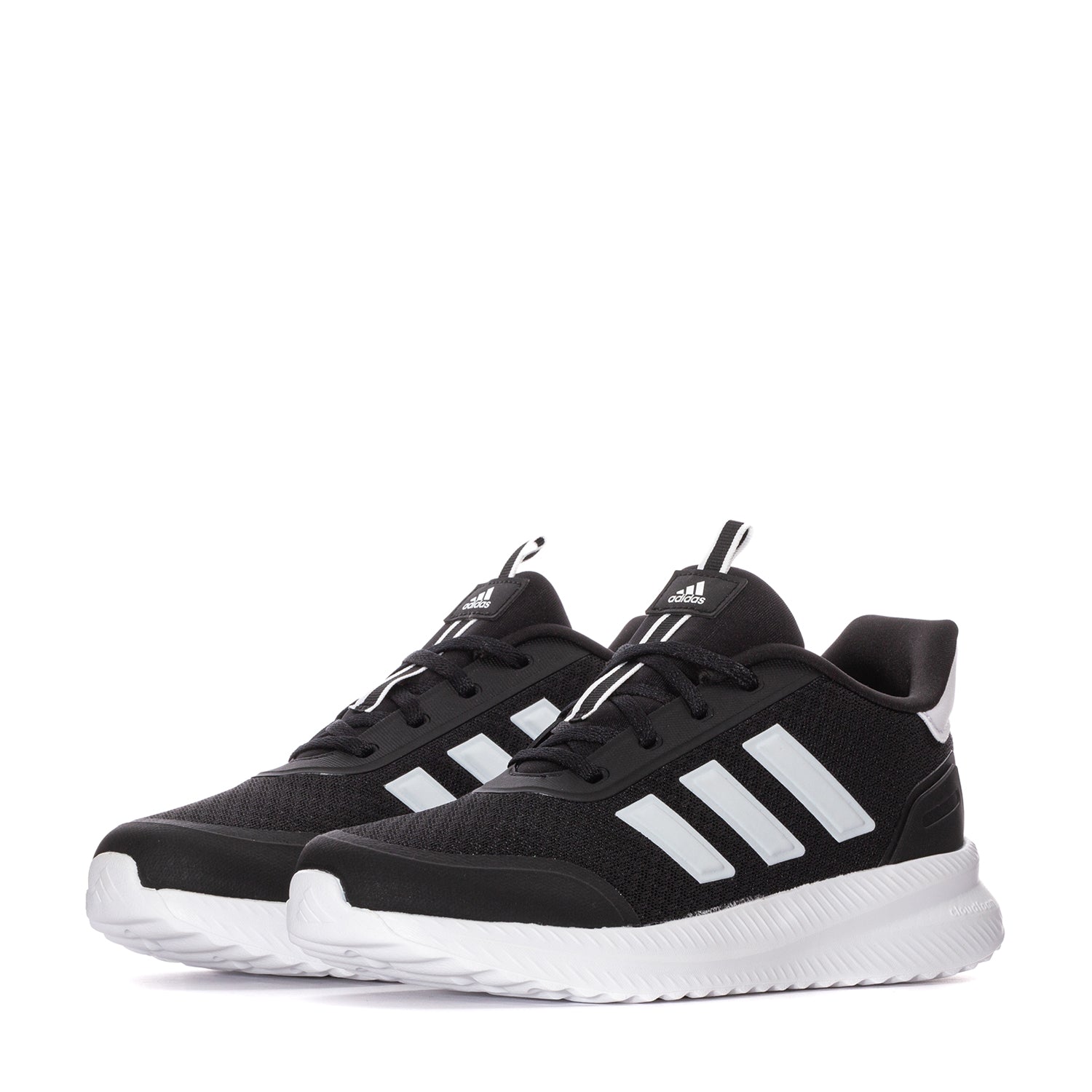 Action shot of kids wearing X_PLR PATH Youth Sneakers during gym class.