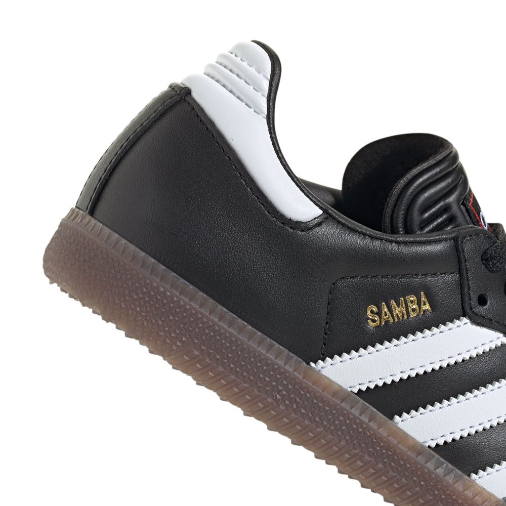 Adidas Samba Classic youth soccer shoes, side view showing the classic design and serrated stripes.