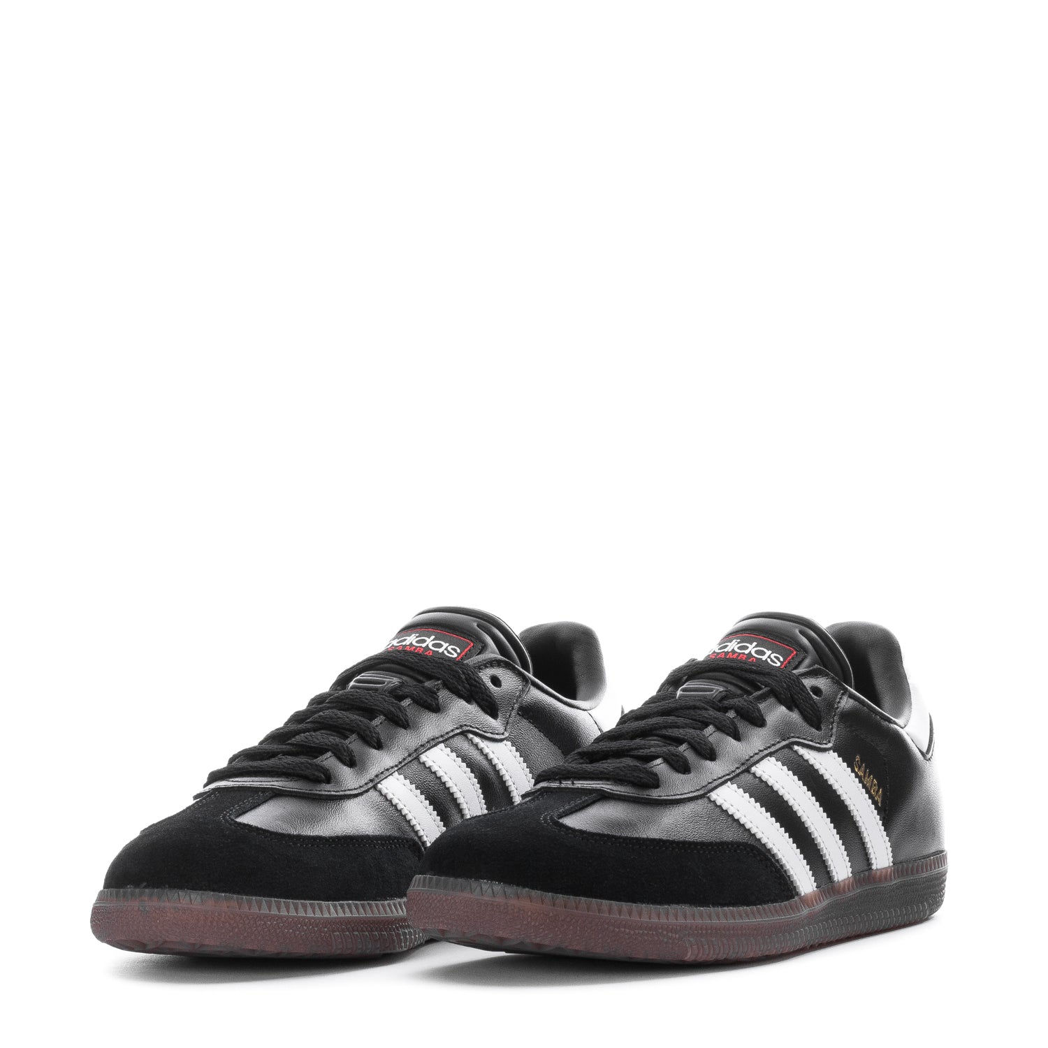 Close-up of the sneakers serrated 3-Stripes and suede toe overlay