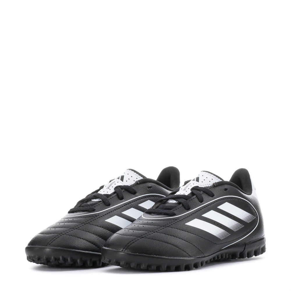 Close-up of Adidas Goletto IX kids soccer shoes highlighting the lugged outsole.