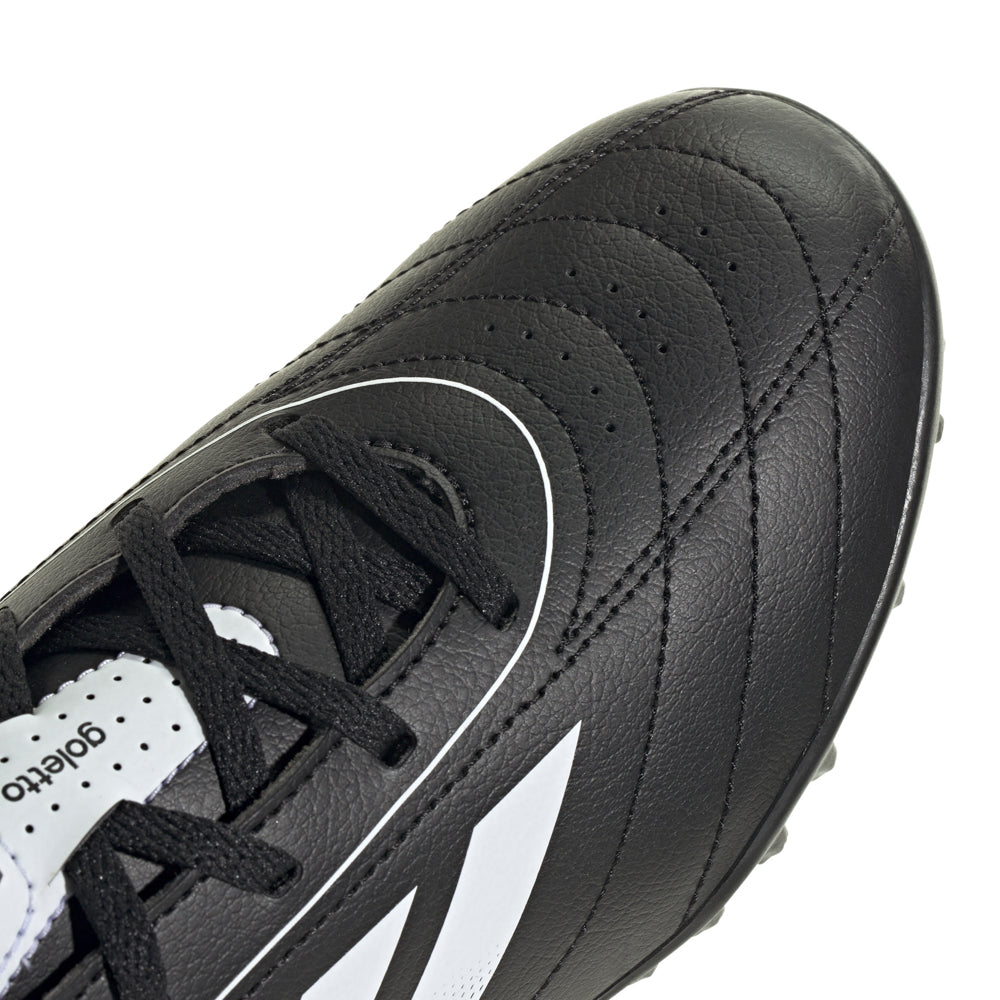 Adidas Goletto IX Youth Soccer Shoes in action on the turf, demonstrating speed and agility.