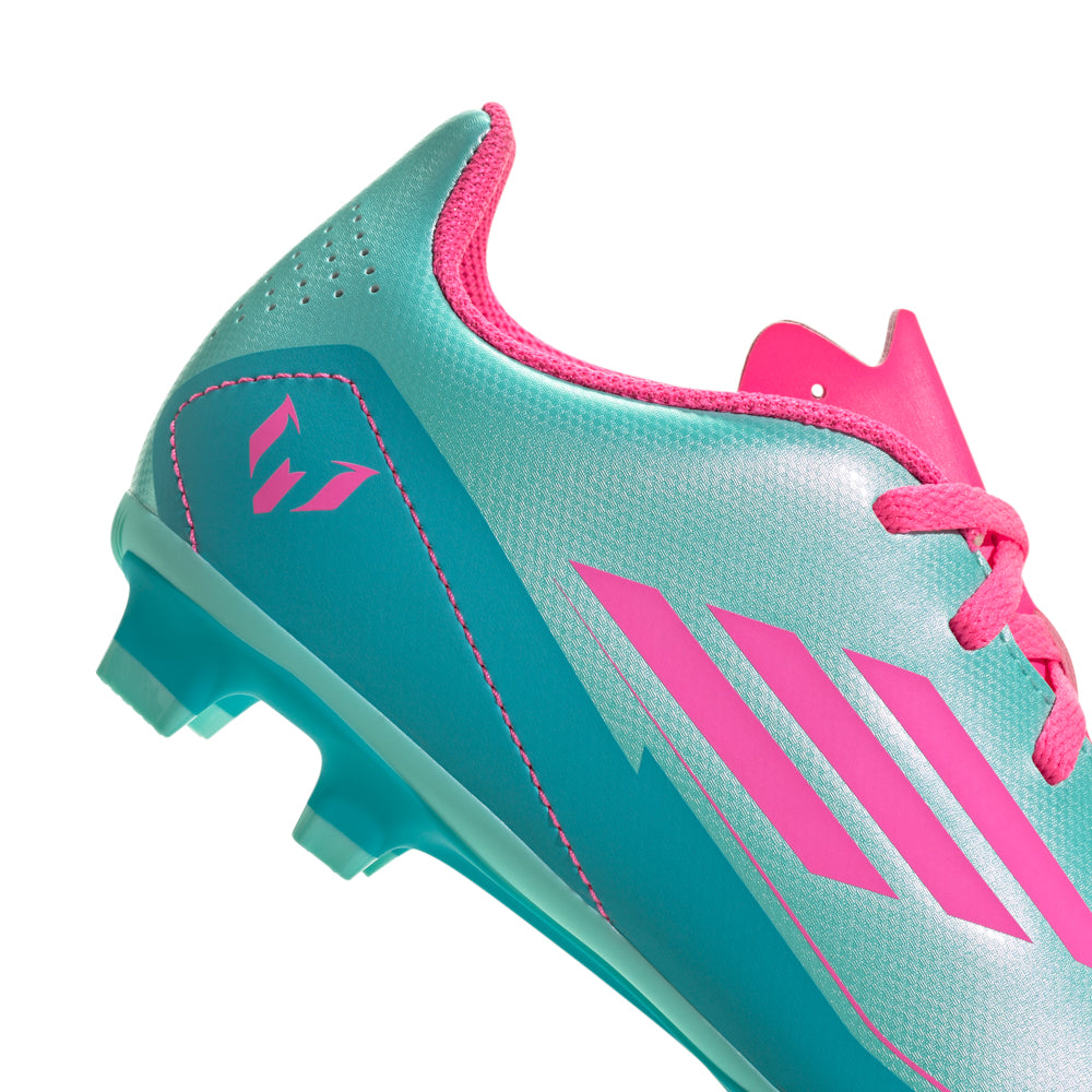 Youth soccer shoes worn on pitch, demonstrating fit and grip during gameplay