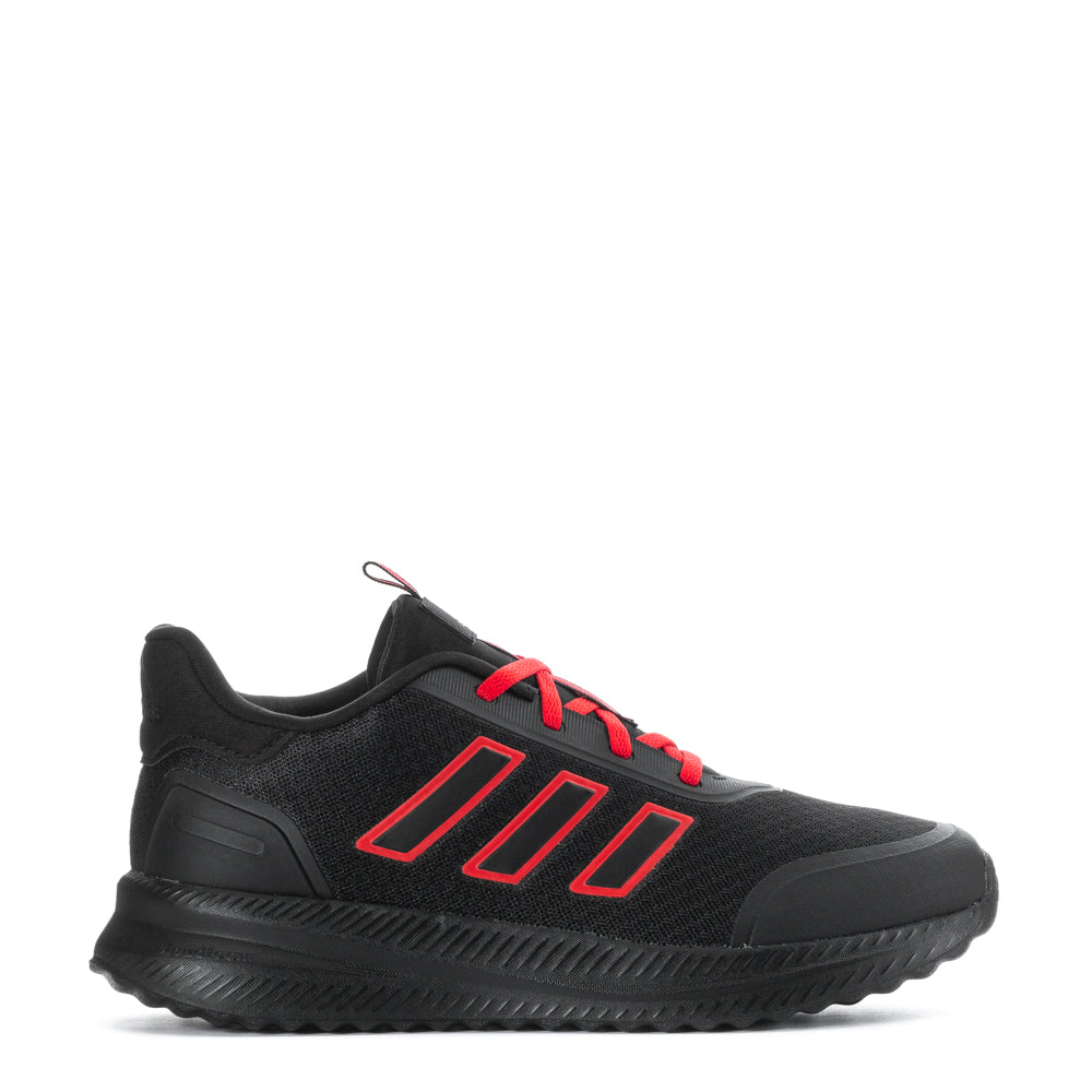 Side view of adidas youth sneakers showing breathable mesh and sleek design