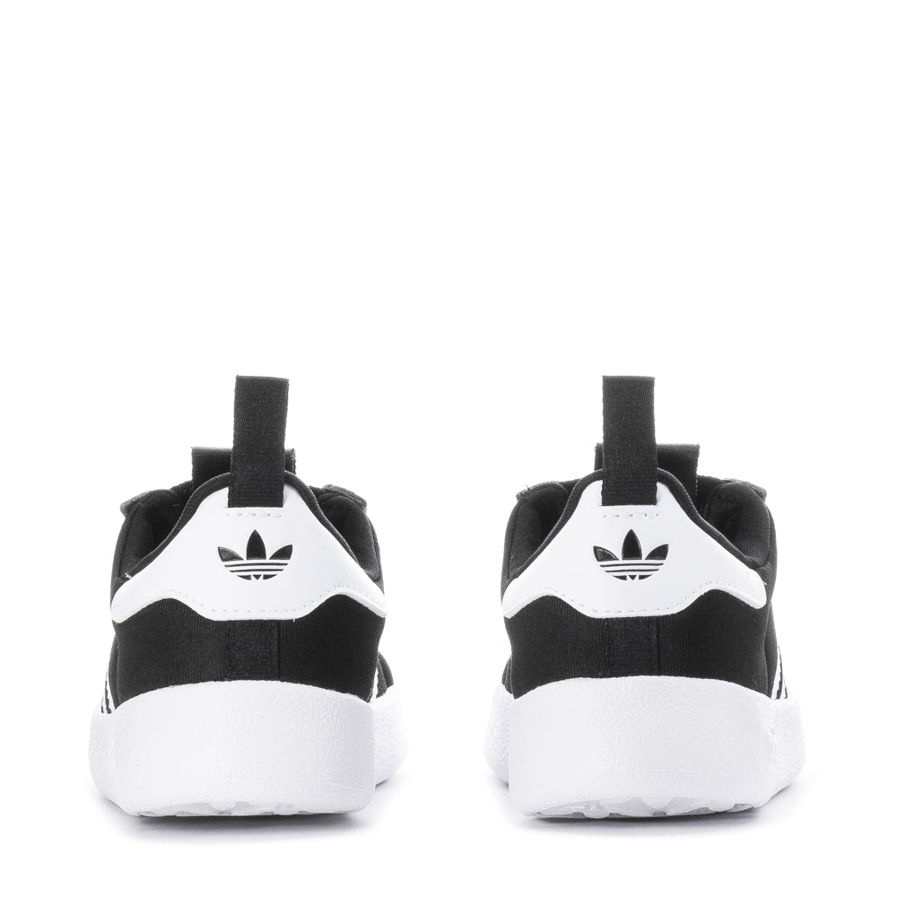 Top-down angle of toddler sneakers highlighting breathable mesh lining and slip-on design
