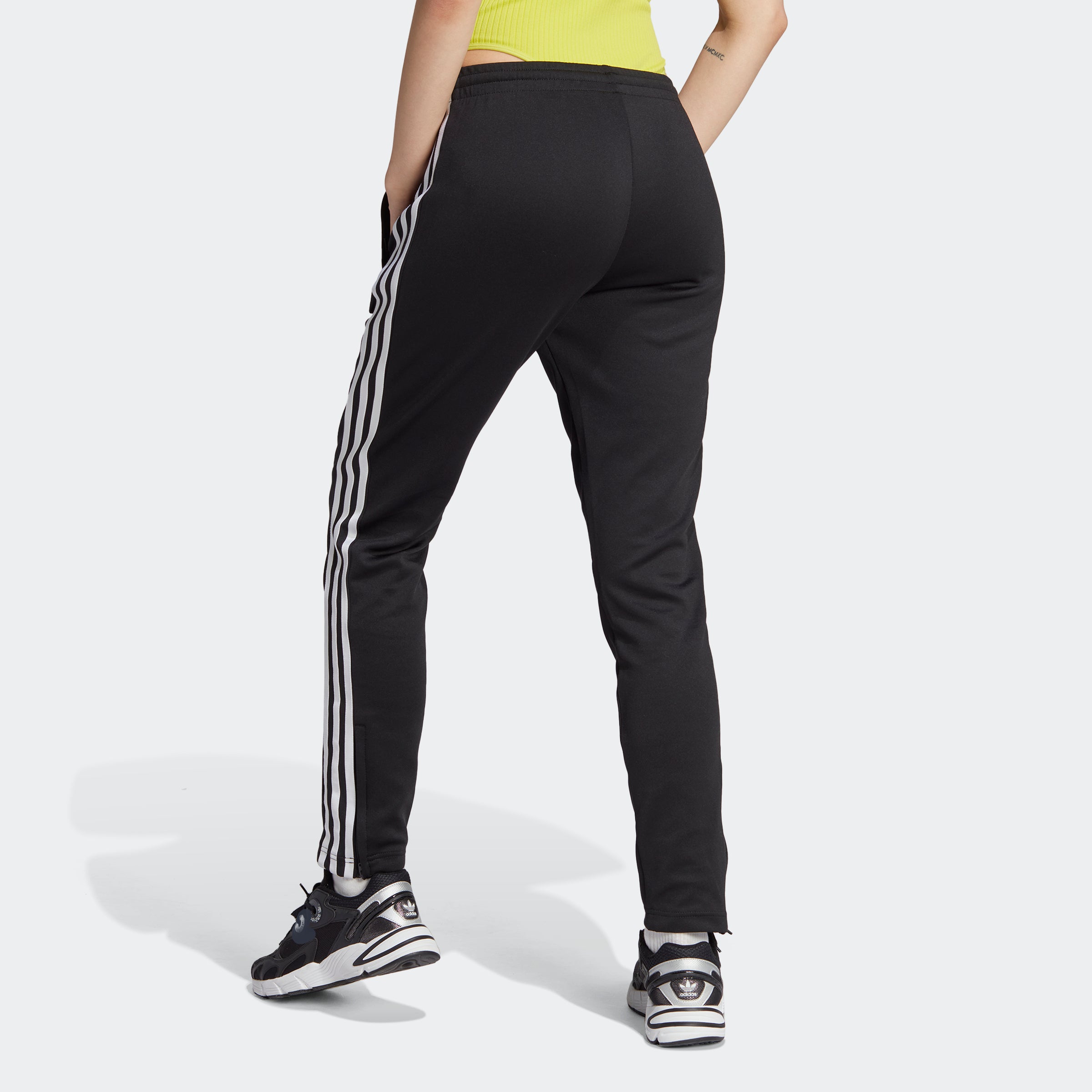 Close-up of the elastic waistband and drawcord of Adidas womens joggers.